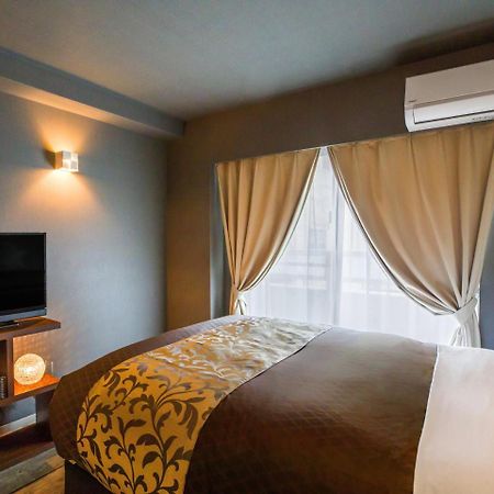 Mr. Kinjo In Gusuku Aparthotel Okinawa Exterior photo